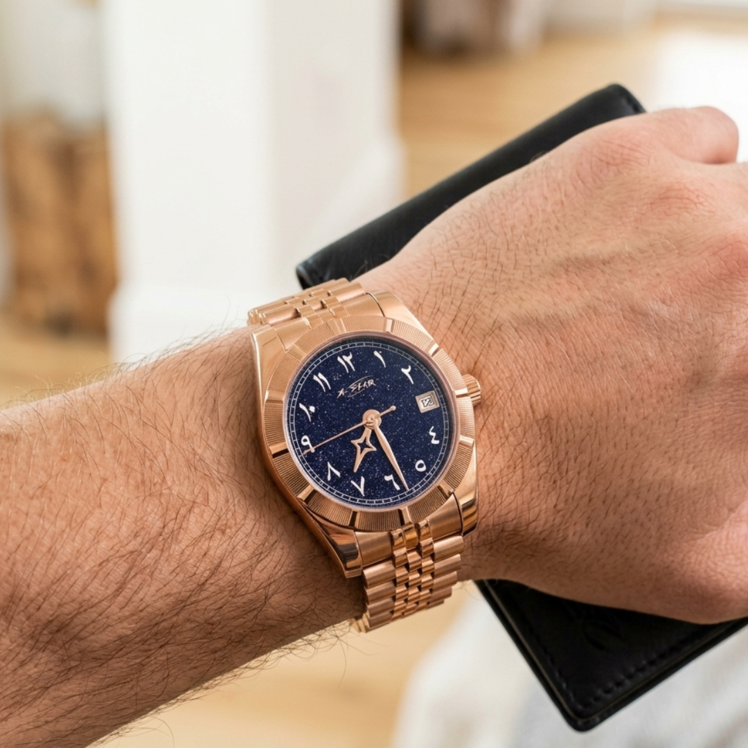 Montre A★Star Arabic Or Rose portée au poignet — bracelet Jubilée or rose, cadran étoilé chiffres arabes blancs