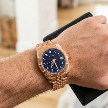 Montre A★Star Arabic Or Rose portée au poignet — bracelet Jubilée or rose, cadran étoilé chiffres arabes blancs